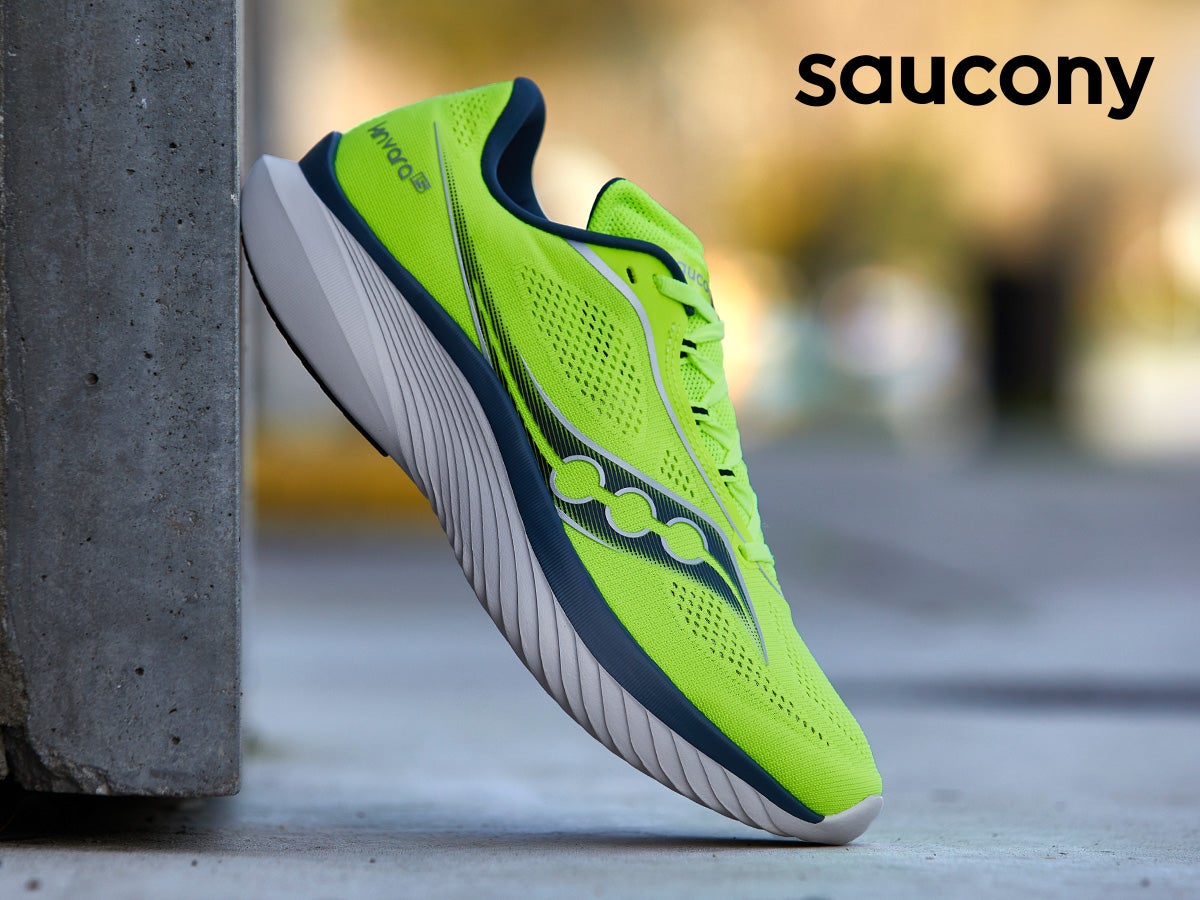 Saucony Kinvara 15 leaning against a wall