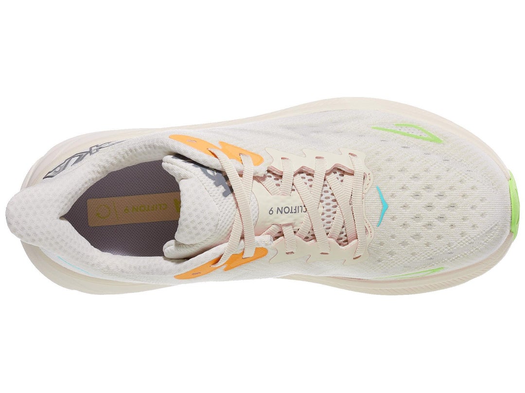 Topview of HOKA Clifton shoe in white color with small accents of grey, pink, orange, blue and neon green