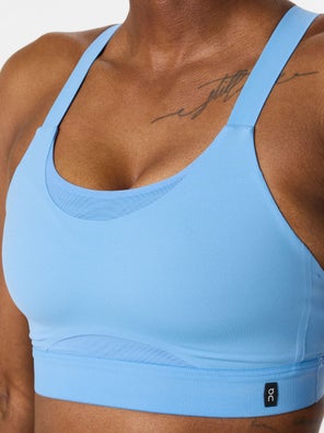 model in On Performance Bra in light blue, front view