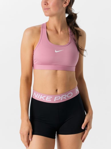 Front of the Nike Swoosh Medium Support Padded Bra in pink
