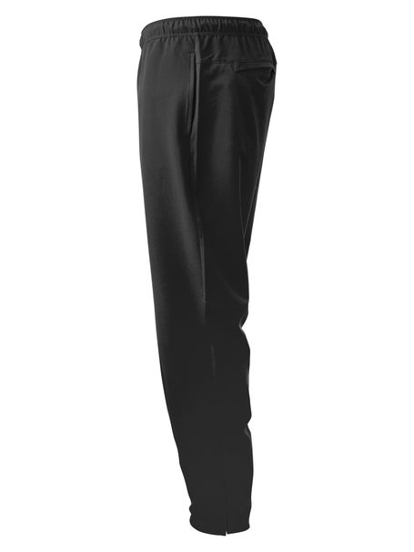 ASICS CORE WOVEN PANT - Tracksuit bottoms - performance black