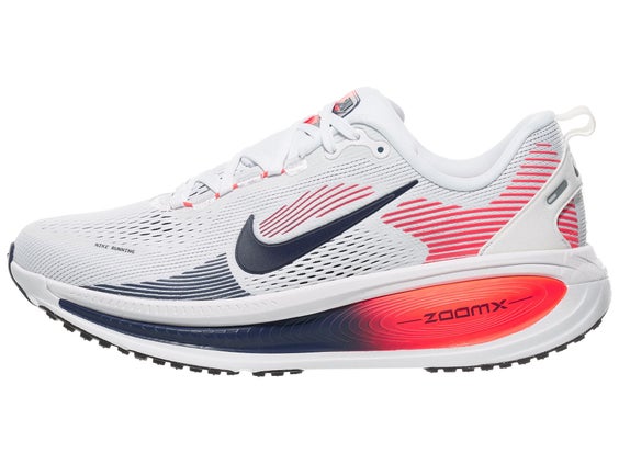 Men's Nike Vomero 18 lateral view of a white, dark blue, and red colorway