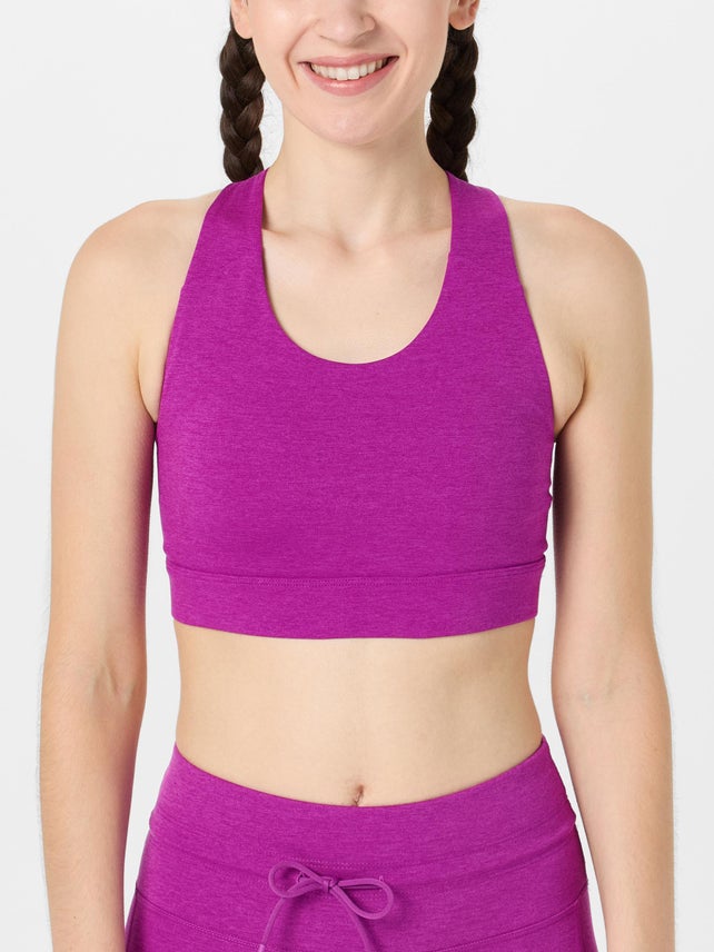 Front view of a model wearing Brooks Luxe Pocket Bra