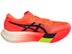 Lateral view of right shoe of ASICS METASPEED Sky Paris. Upper is red with black ASICS logo. Midsole is painted red.