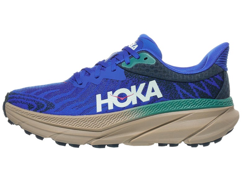 Best trail running shoe HOKA Challenger 7. Upper is blue with a white HOKA logo and a tan midsole. 