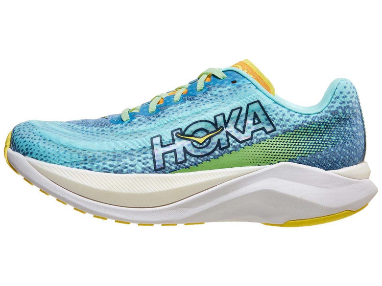 HOKA Mach X: Upper is iridescent green and the midsole has a top layer of white cushioning on top of a green layer of cushioning. 