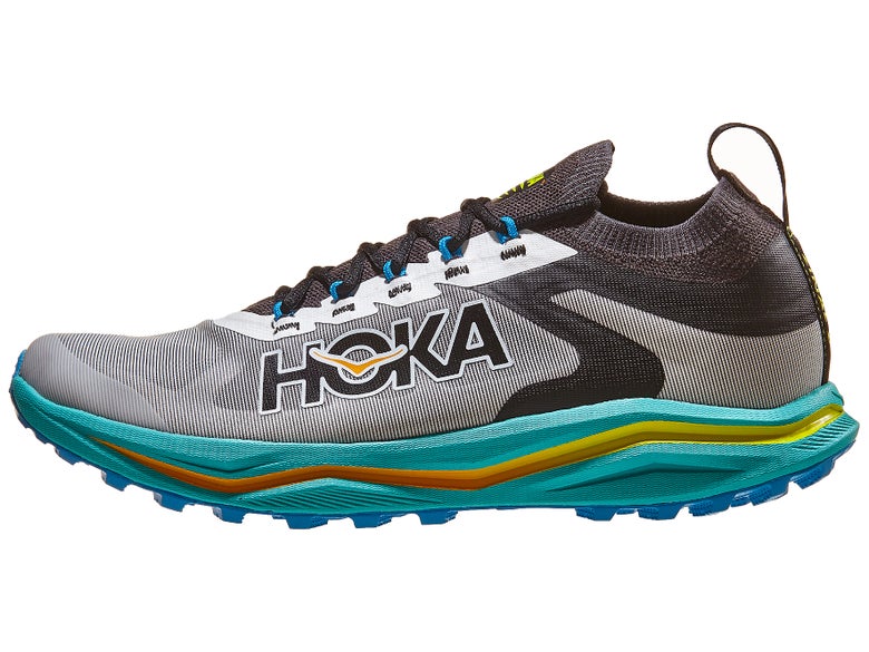 HOKA Zinal 2 shoe. The upper is gray and black with a black HOKA logo and the midsole is turquoise green and orange.