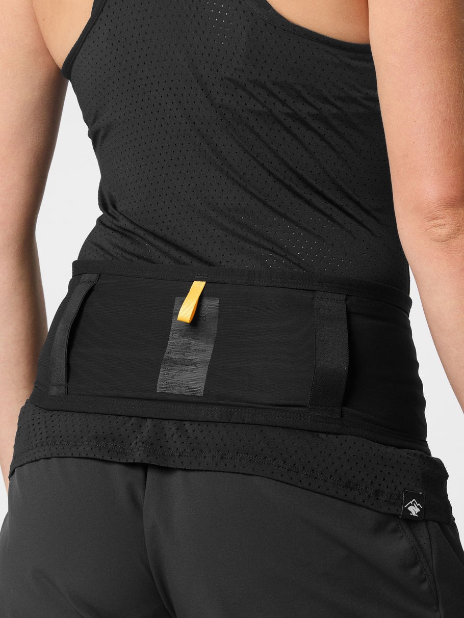 Back view of runner wearing Naked Running Hydration Band