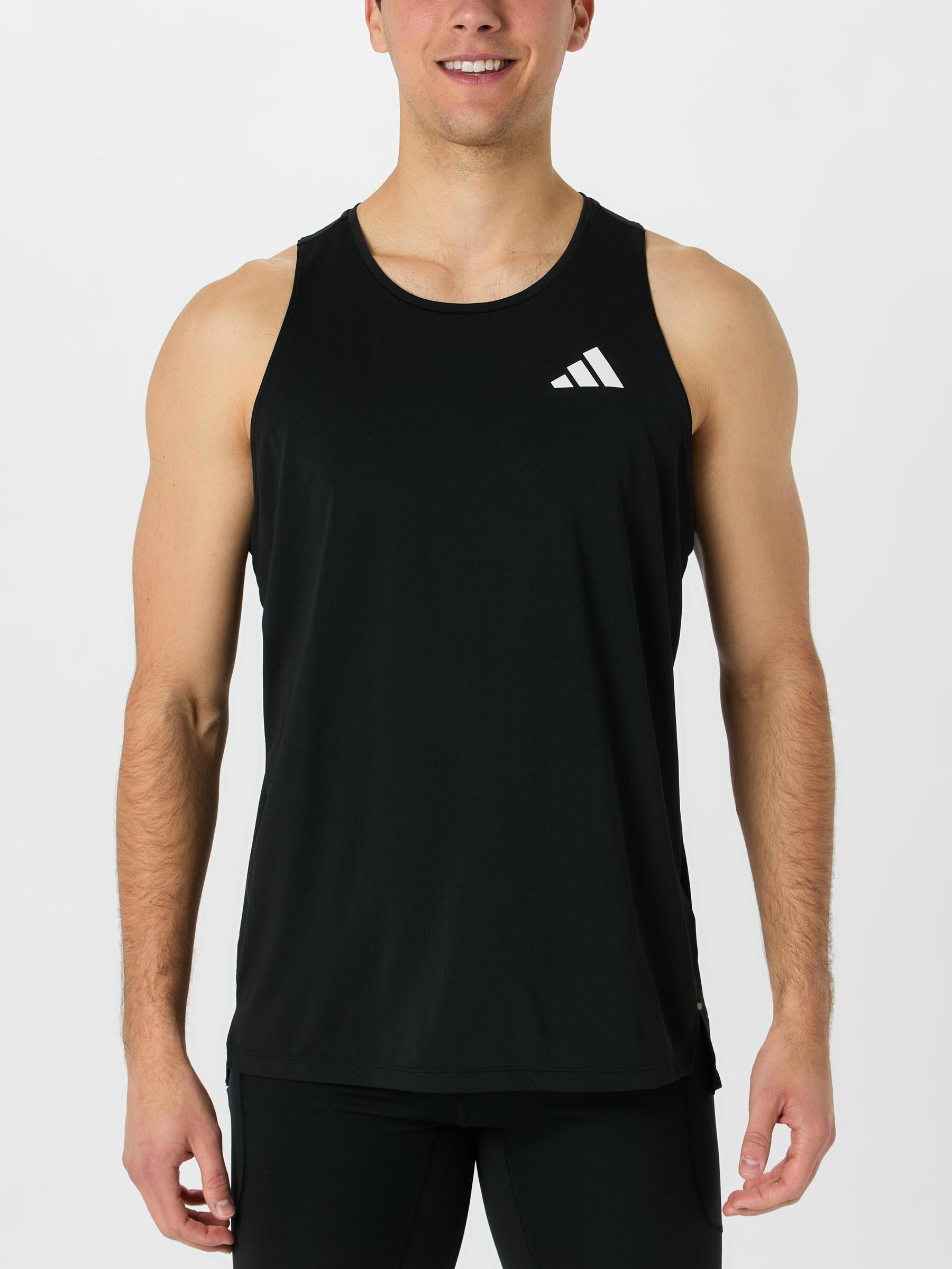 Front view of model wearing adidas adi365 Tank in black colorway