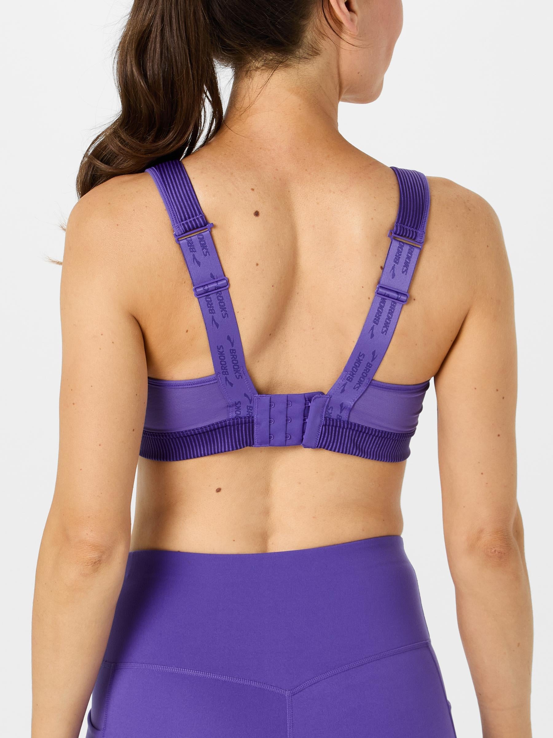 Back view of a model wearing a Brooks Convertible 2.0 sports bra