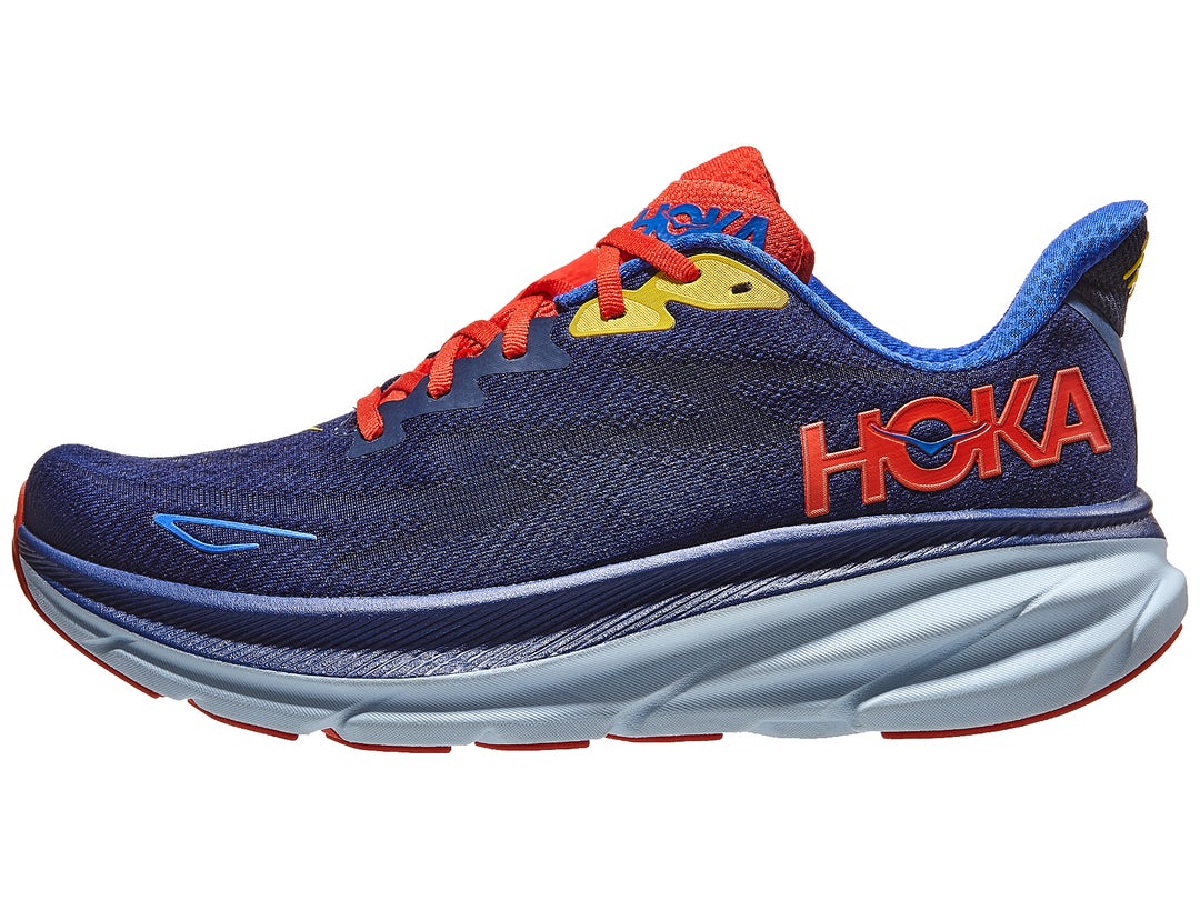 HOKA Clifton 9 in navy blue upper, light blue midsole and orange laces/details