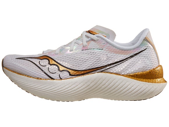 Left shoe of the Saucony Endorphin Pro 3. Upper is white and gold. Midsole is white.