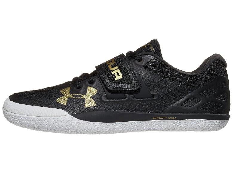 Under Armour Centric Grip Throw Shoe in black color and gold logo, outsole is white color