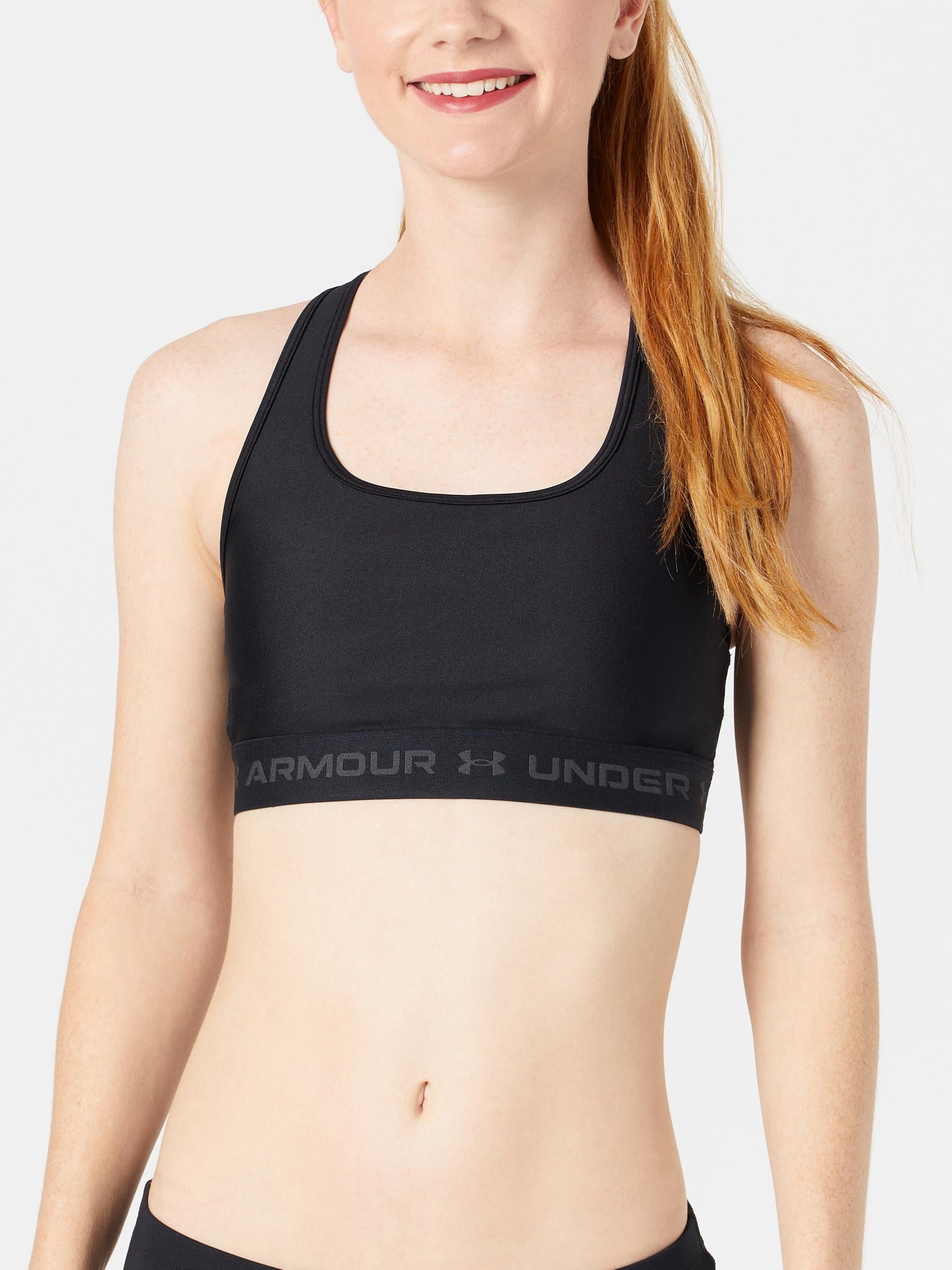 Front view of model wearing an Under Armour Crossback Mid Bra