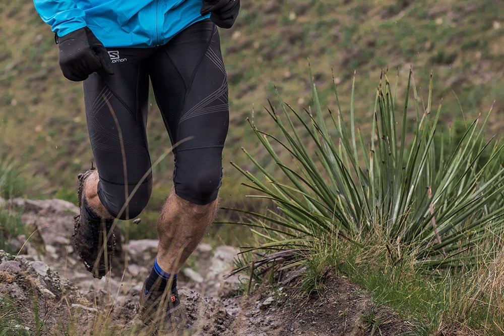 Man in dirty trail shoes