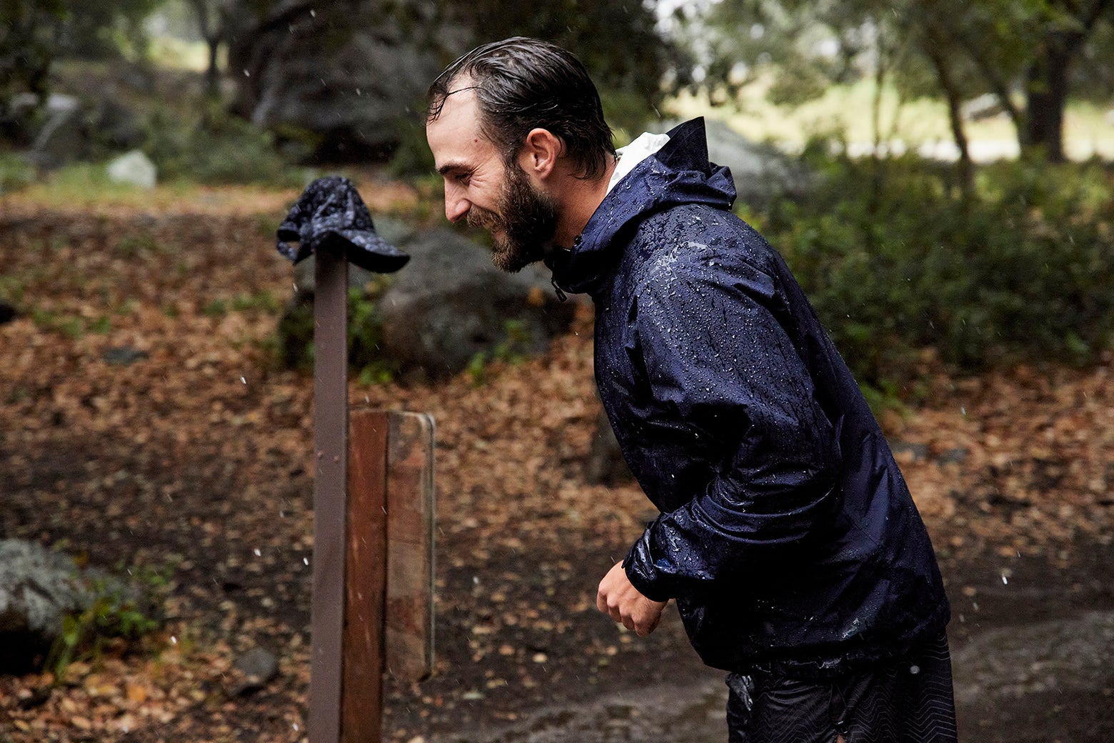 Male wearing a running jacket in rainy weather