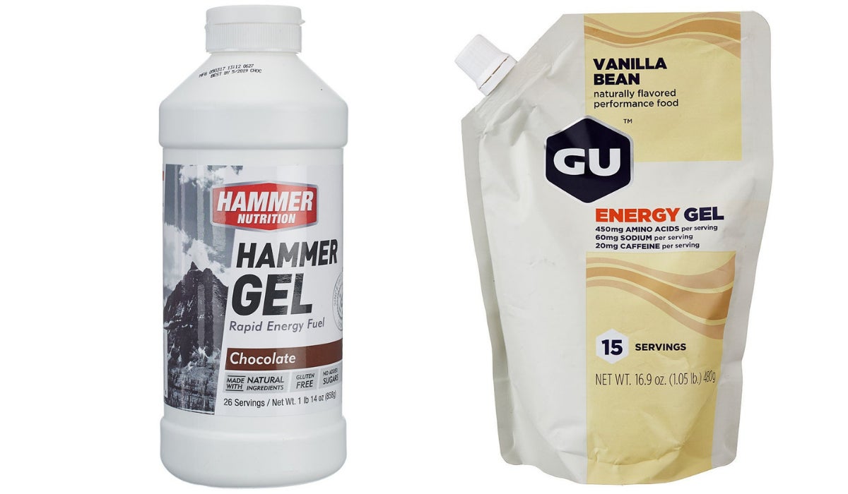 Two energy gel containers are side by side. The left is a white Hammer Nutrition bottle labeled 