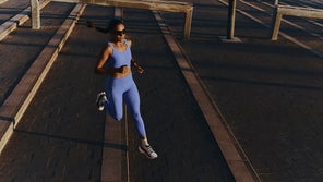 runner in On Performance bra and leggings in urban setting