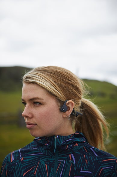 side view of headphones on woman