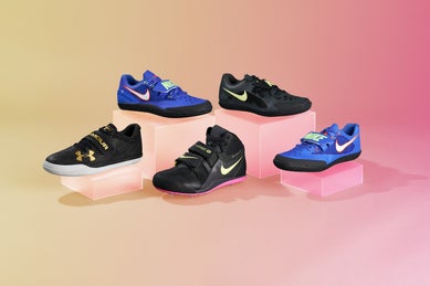 Five throw shoes stacked on top of boxes