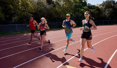 Runners running on a track