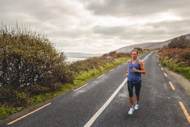 Woman running on road