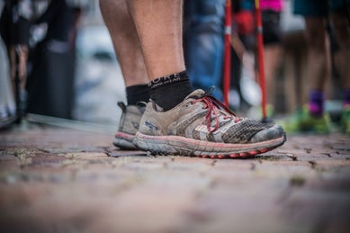 Close up of muddy running shoes