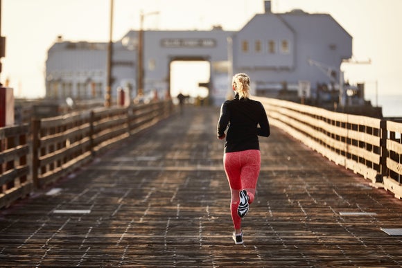 women running on pier