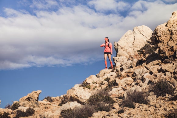 woman running on trail