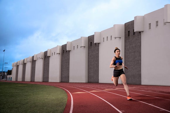 women running on track