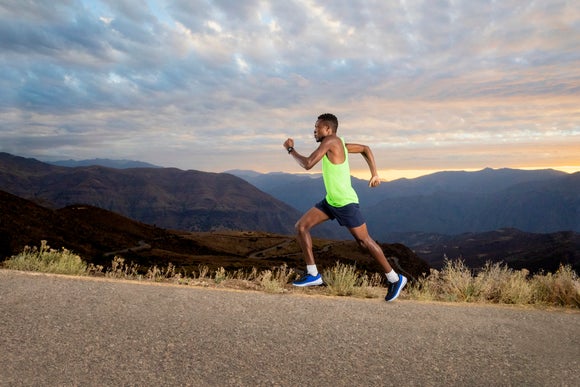 man running on road