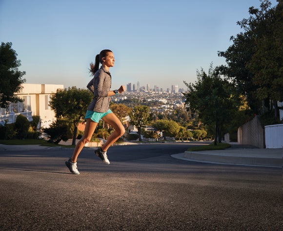 Woman running alone in the city