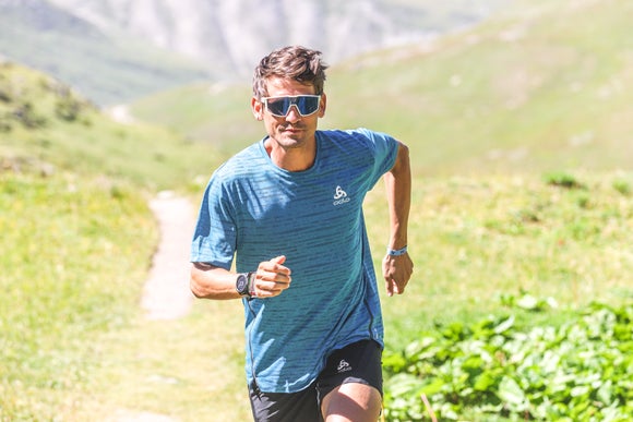 Runner on grassy trail