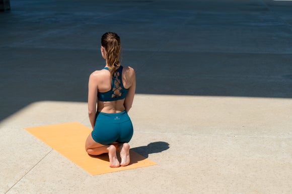 A runner doing yoga