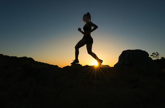 Silhouette of trail runner