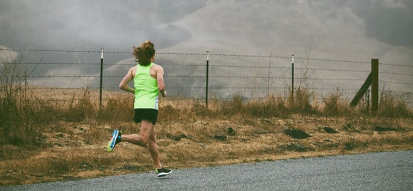 man running on road