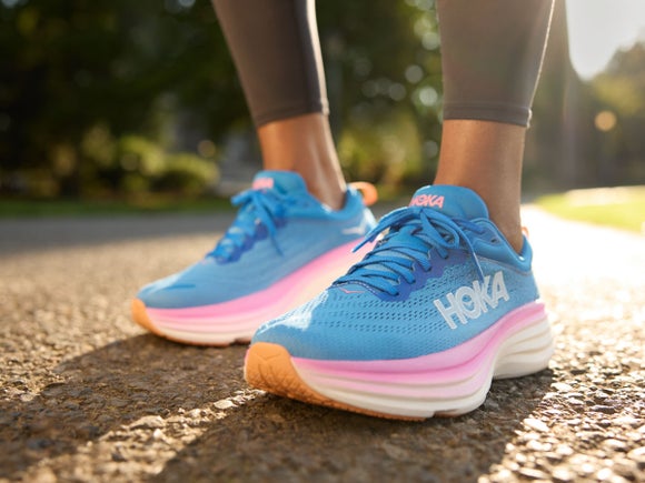 Close up of HOKA Bondi on a person's feet.