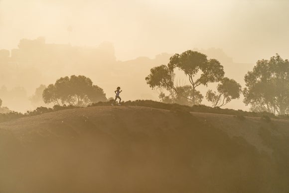 A runner in the distance