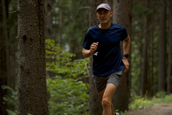 man running in forest