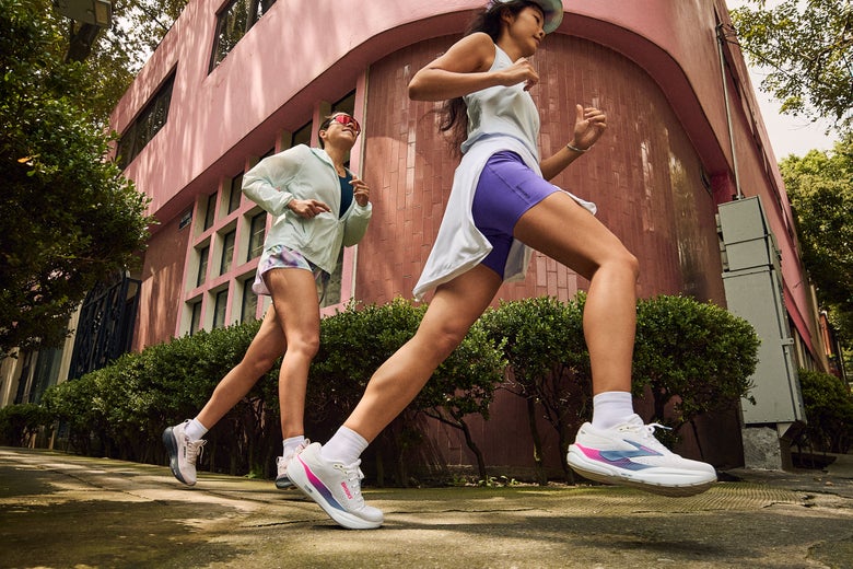 Two runners in Brooks road running shoes