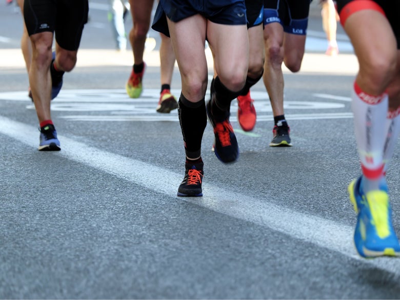 Legs and shoes during a race