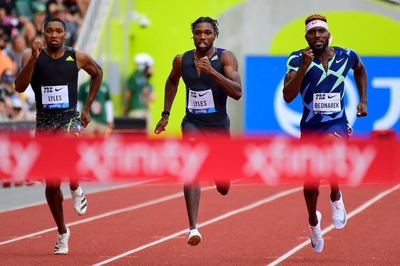 Best Track and Field Spikes for Beginners Three sprinters approaching finish line
