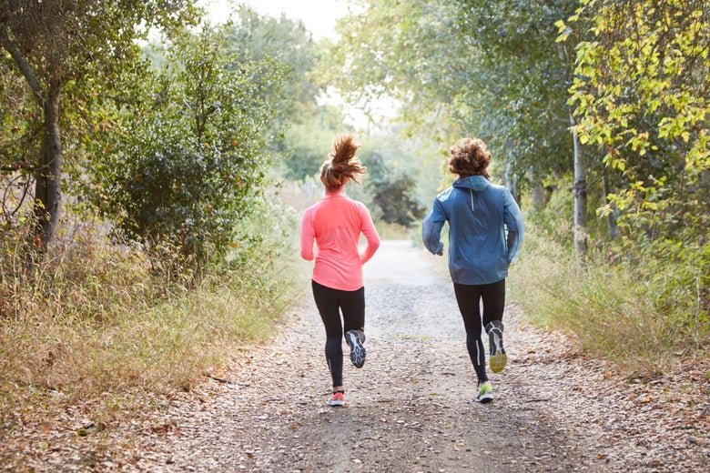 Two people running
