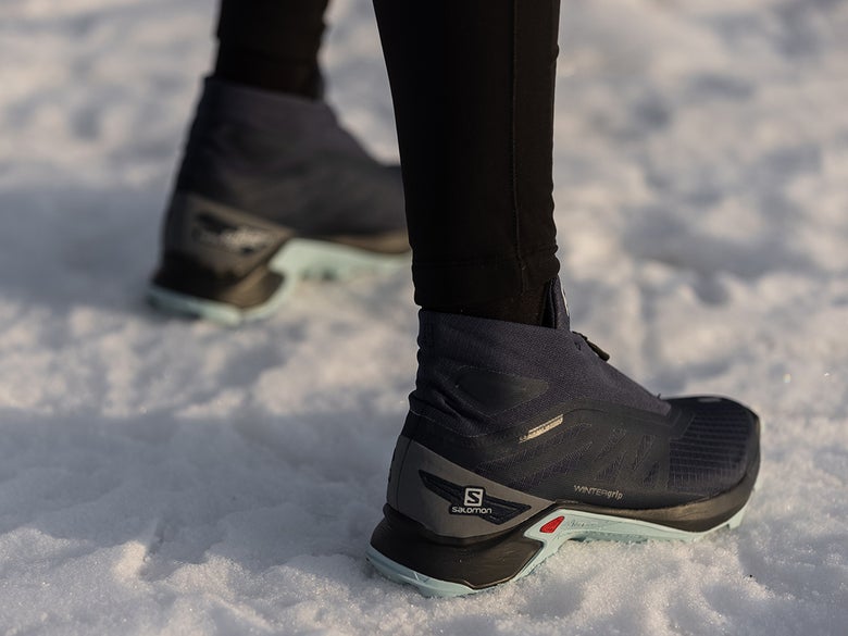Pair of shoes in snow, ready to run