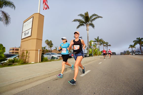 Two women running a 5K