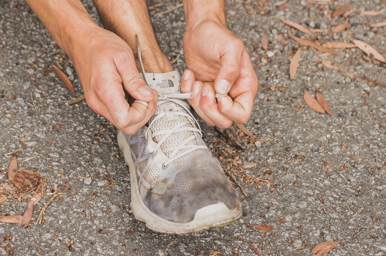 tying a dirty shoe