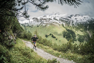 Trail running in the snowy mountains