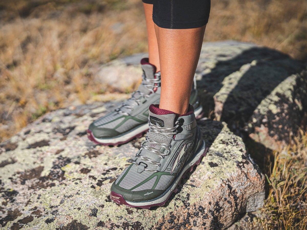 Close up shot of Salomon trail shoes on foot