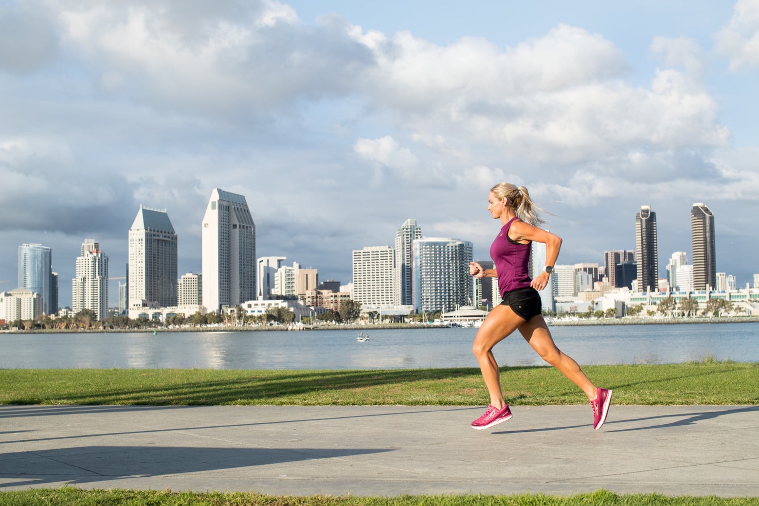 A runner with a city skyline