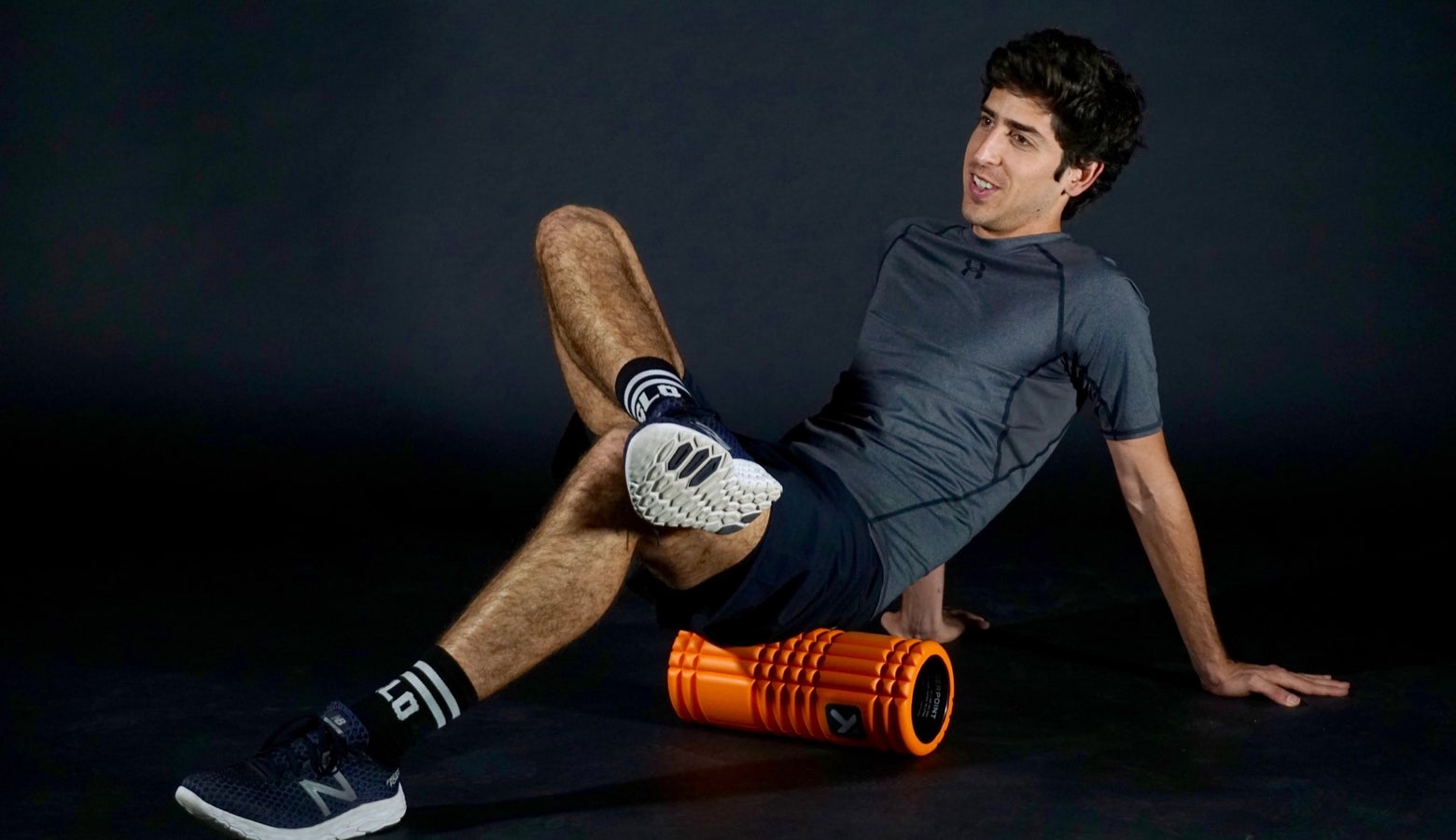Foam rolling the glutes and hips